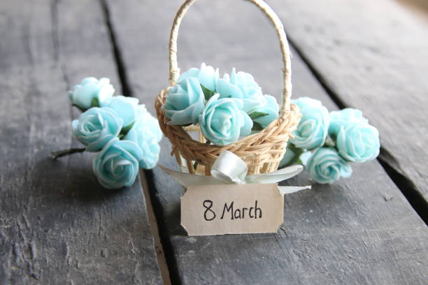 istock March 8. Rustic still life, roses and tag 646900854
