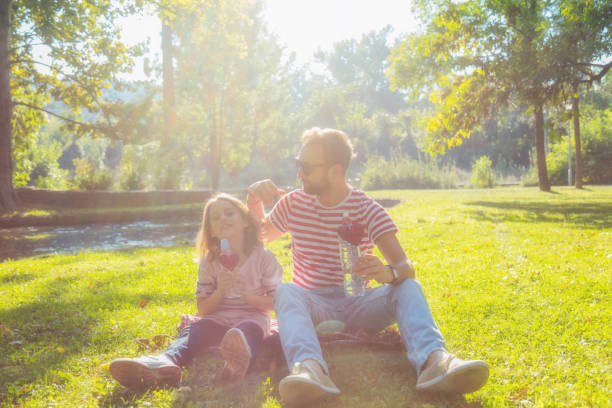 istock Father and daughter enjoying in the park. 646901770