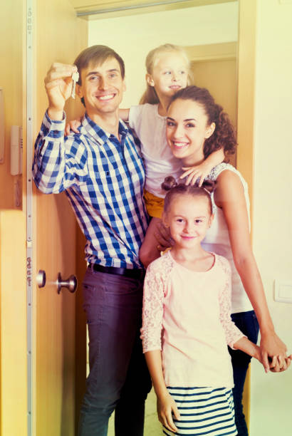 istock Middle class family in new house 646901788