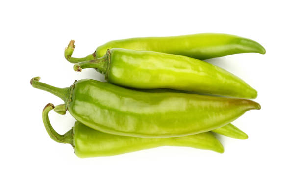 istock Green fresh jalapeno peppers close up on white 646906456