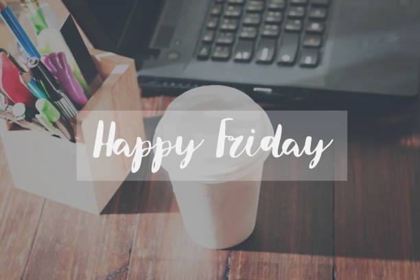 Concept Happy friday message on the device works the table background