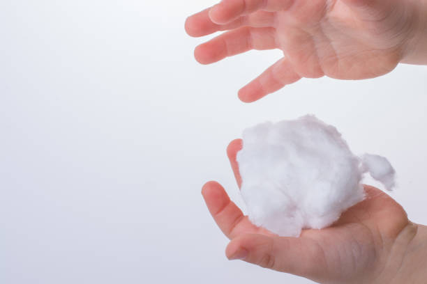 istock Hand holding some cotton in hand 646914990