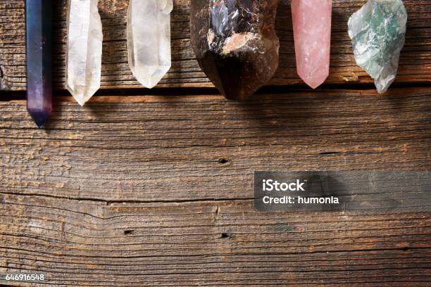 Multiple Semi Precious Gemstones On Board Stock Photo - Download Image Now - Spirituality, Recovery, Crystal