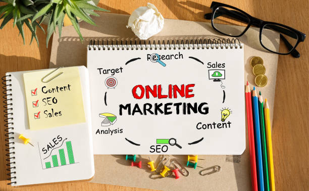 istock Notebook with Toolls and Notes about Online Marketing 646918662