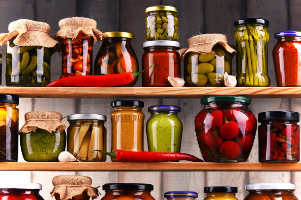 istock Jars with variety of pickled vegetables. 646918824