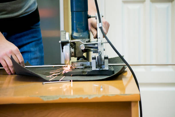 istock man cuts metal and sparks 646919474
