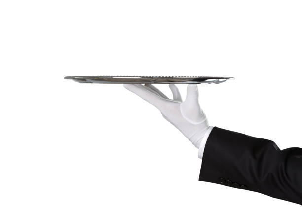 Empty silver tray Waiter holding empty silver tray isolated on white background with copy space waiter photos stock pictures, royalty-free photos & images