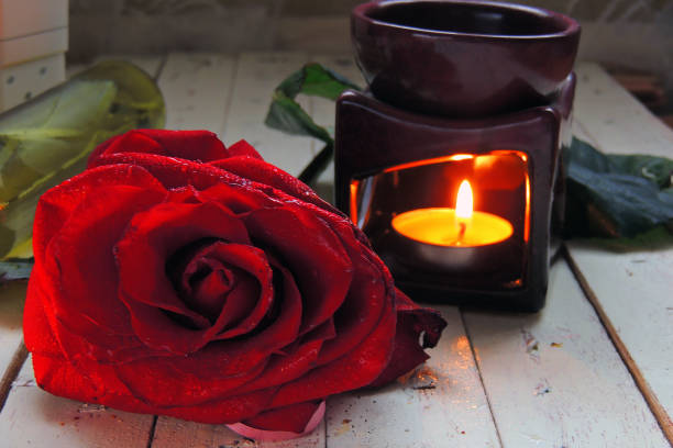 istock Petals of roses and candles 646923676