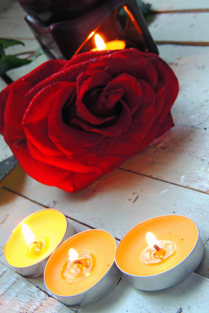 istock Petals of roses and candles 646923760
