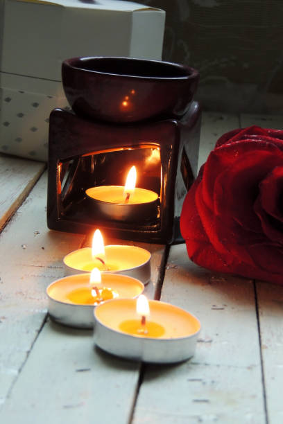 istock Petals of roses and candles 646923842