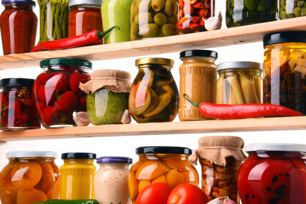 istock Jars with variety of pickled vegetables. 646927916