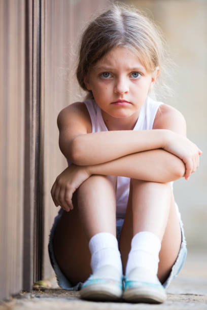 istock sad girl outdoors 646930248