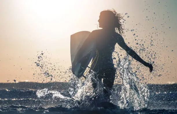 Photo of Woman surfer