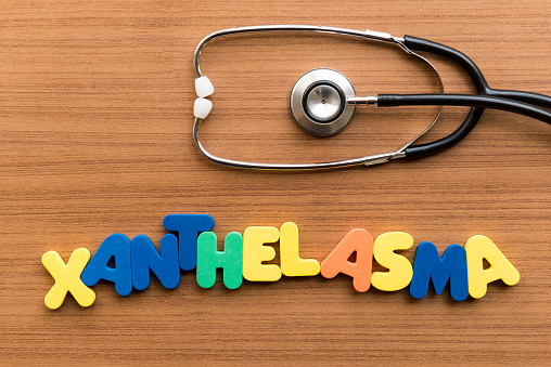 xanthelasma colorful word with stethoscope on wooden background