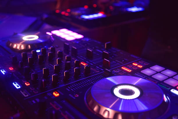 istock nice mixer dj with purple tones 646945510