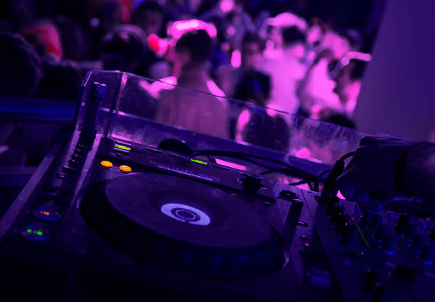 istock night party view from dj mixer 646945528