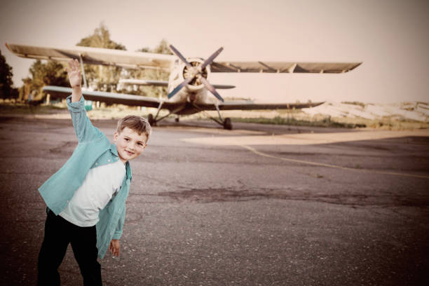 istock little boy in the airport 646946774