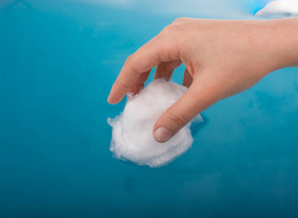 istock Hand holding some cotton in hand 646950606