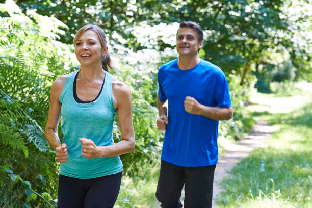 istock Mature Couple Running In Countryside 646951176
