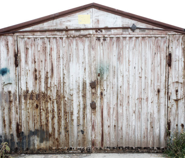 istock old metal warehouse door 646974002