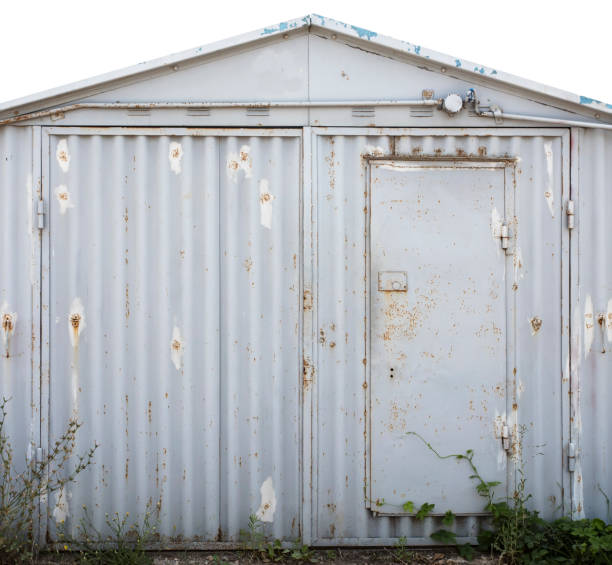 istock old metal warehouse door 646974100