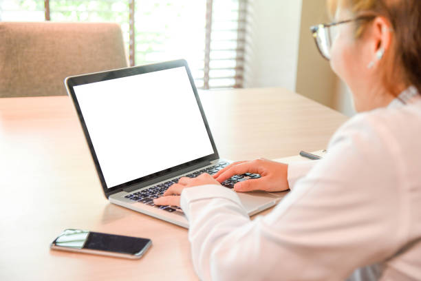 istock Businesswoman typing on laptop in workplace 646977468