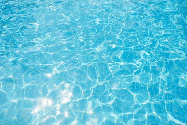 istock Beautiful ripple wave and blue water surface in swimming pool 646980728