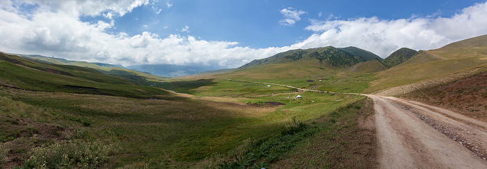 Steppe Kazakhstan, Trans-Ili Alatau, plateau Assy, a road is in mountains
