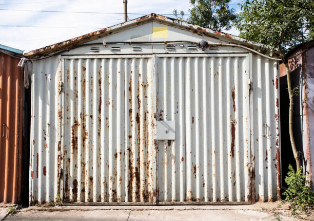 istock old metal warehouse door 646985830
