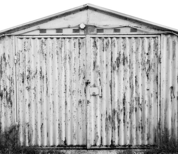istock old metal warehouse door 646985940