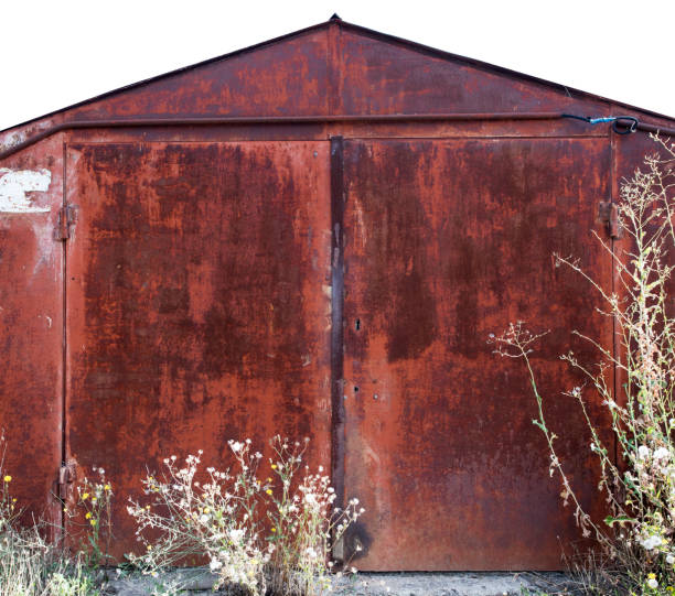 istock old metal warehouse door 646985988
