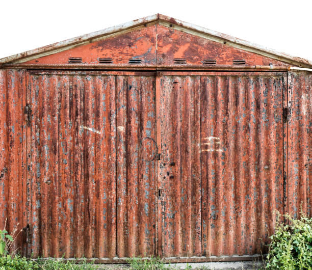 istock old metal warehouse door 646988250