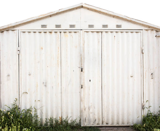 istock old metal warehouse door 646988924