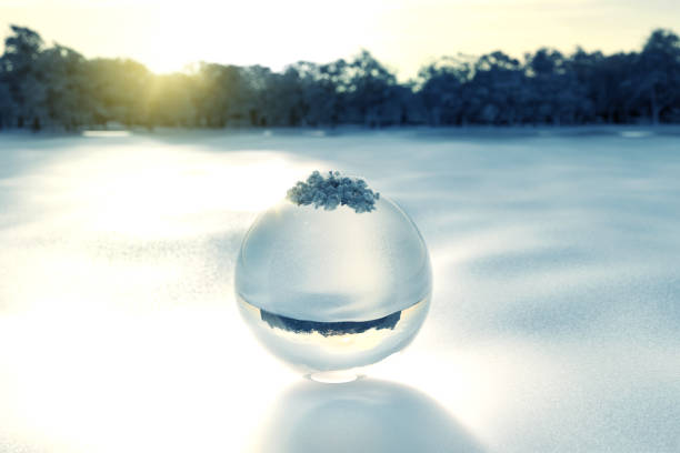 istock 3d rendering of crystal ball on snow 646989868
