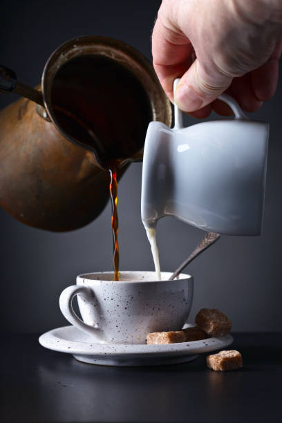 istock Cup of coffee with milk and brown sugar 646993038