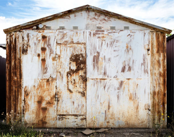 istock old metal warehouse door 646996832