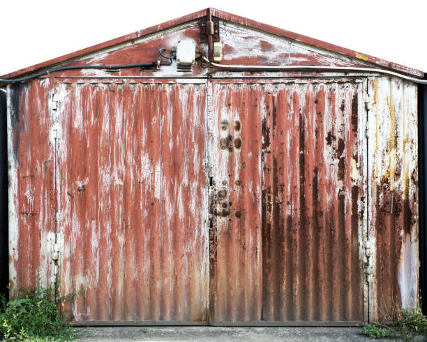 istock old metal warehouse door 646996920