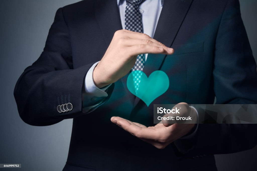 life and health insurance. businessman hands closeup. a man in business suit shows caring gesture. life and health insurance. Accidents and Disasters Stock Photo