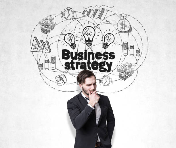 istock Thoughtful man and business strategy sketch 647001364