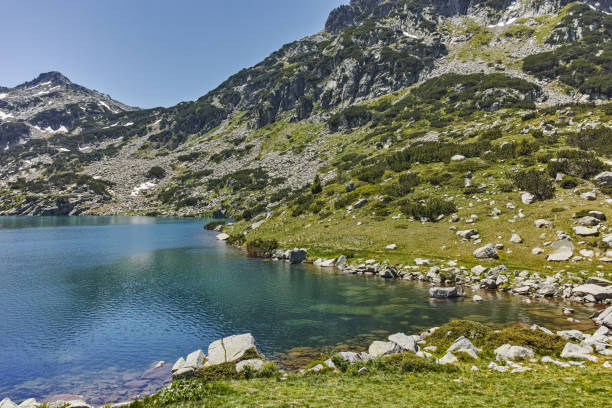 istock Demirkapiyski chukar peak and Popovo lake, Pirin Mountain 647001404