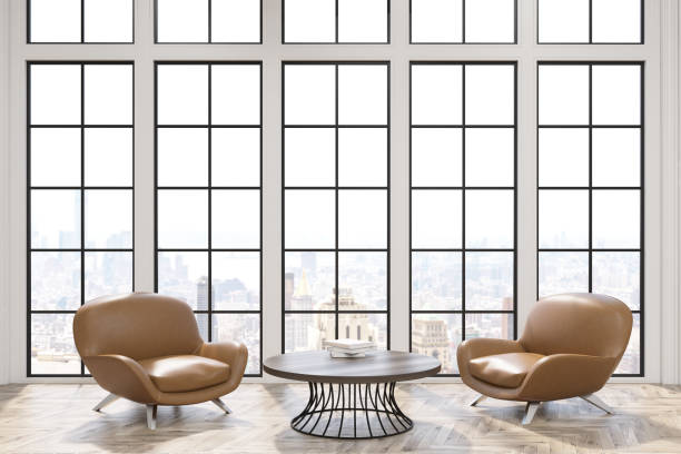 istock Office waiting room with leather armchairs closeup 647004668