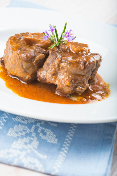 istock Oxtail stew decorated with rosemary flowers 647011506