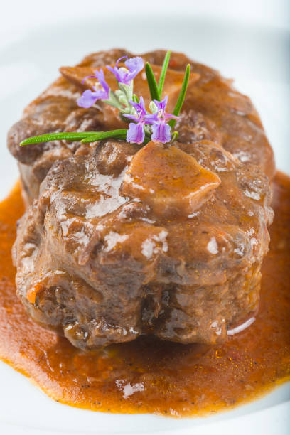 istock Oxtail stew decorated with rosemary flowers 647012032