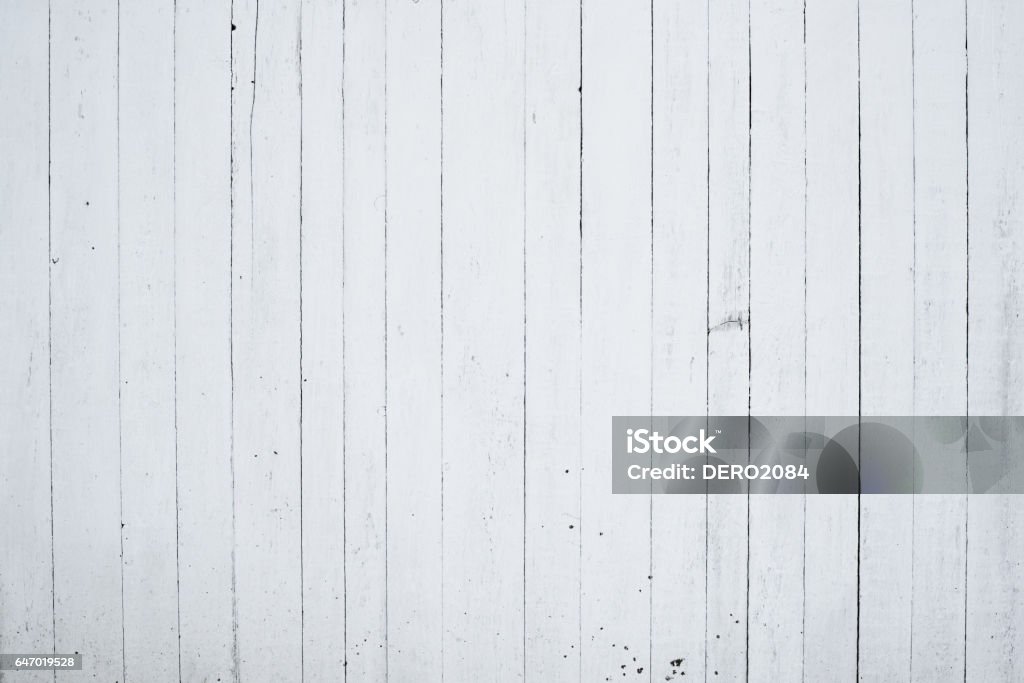 Old wooden wall painted with lime, the back side of the house Collection backgrounds and textures. Photos wall surfaces old urban houses, rural houses, warehouses, barns and sheds. Materials: wood, brick, cement, plaster, stone and clay. Whitewashed Stock Photo