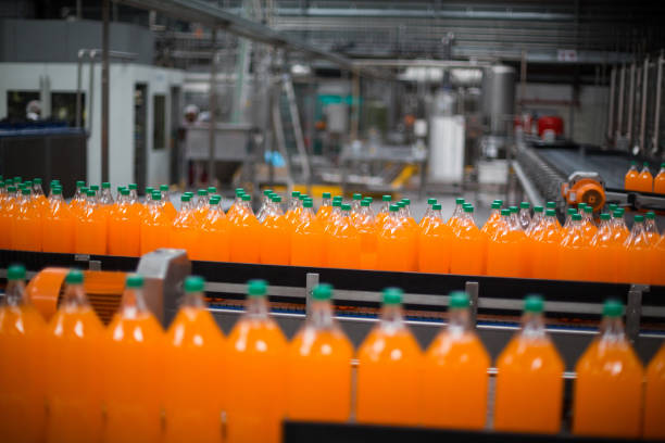 istock Bottle of juice processing on production line 647022910