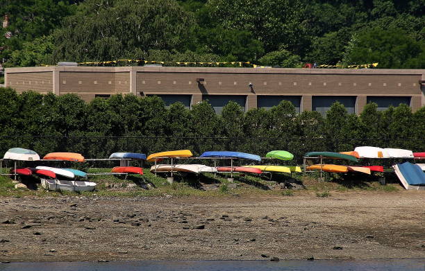 istock Row of Canoes 647023088
