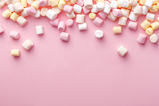 Colorful marshmallows background with copy space. Top view