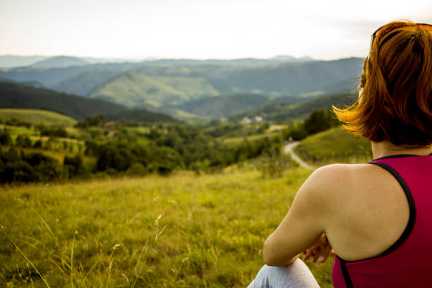 istock Woman Relaxing After Hiking 647036380