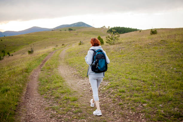 istock Woman on hiking trail 647040560
