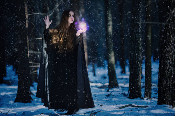 istock Enchantress at the magic bullet in the enchanted forest 647053794